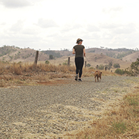 Woman and dog on trail