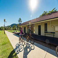 Bicycle riders at Esk Station
