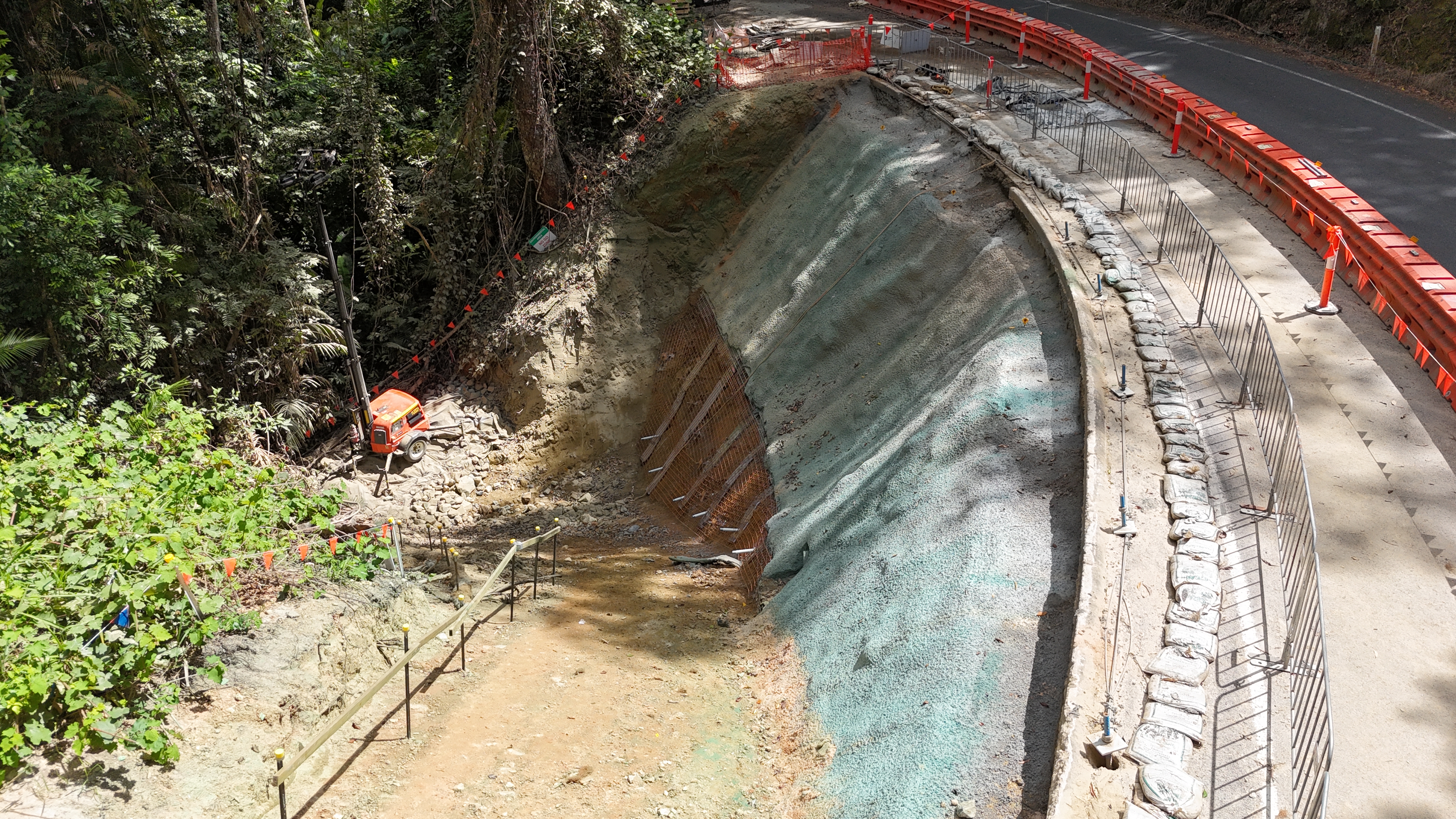 Construction site of the downslope on the side of the hill and next to the Mossman - Mount Molloy road.
