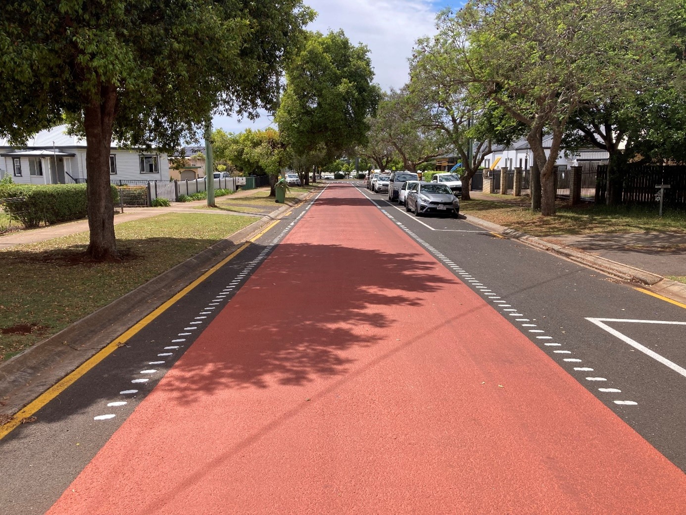 Goode Street with ‘safe active street’ road markings, designed for people riding and driving to share at low speed. 