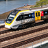 Front of train on a bridge with many tracks