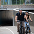 2 people riding bicycles