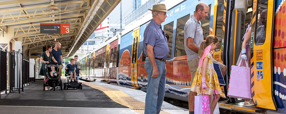 People getting on a train.
