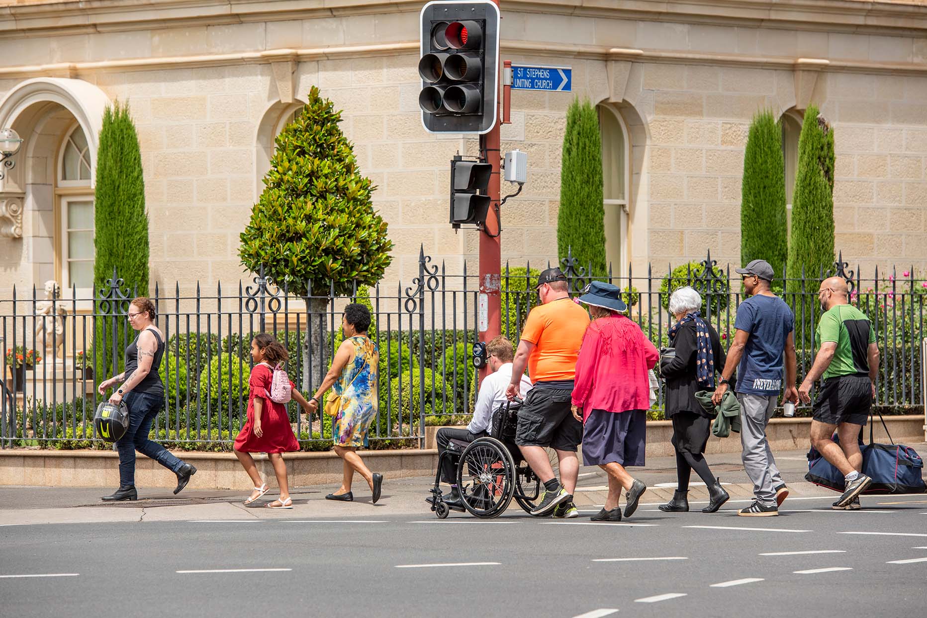 group of people crossing the road